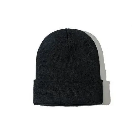 Plain black knitted beanie with a folded cuff on a white background