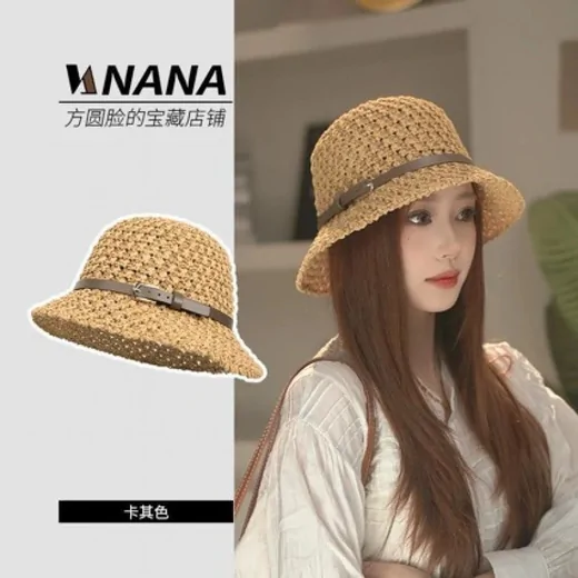 Straw bucket hat with a narrow brown band, shown on its own and worn by a woman