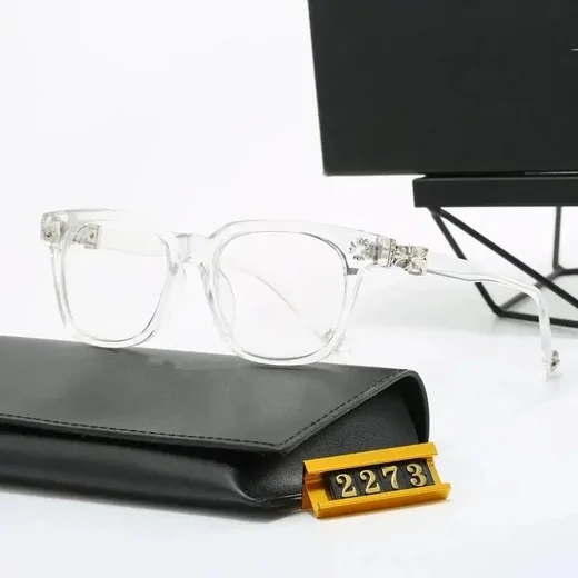See-through rectangular glasses frame lying on a black glasses case