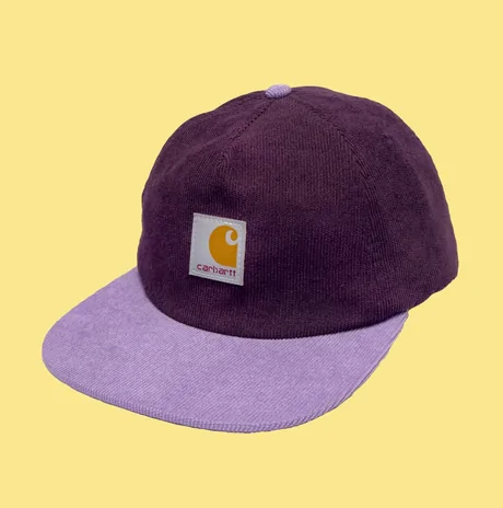 Purple six-panel cap with a lilac brim on a yellow background