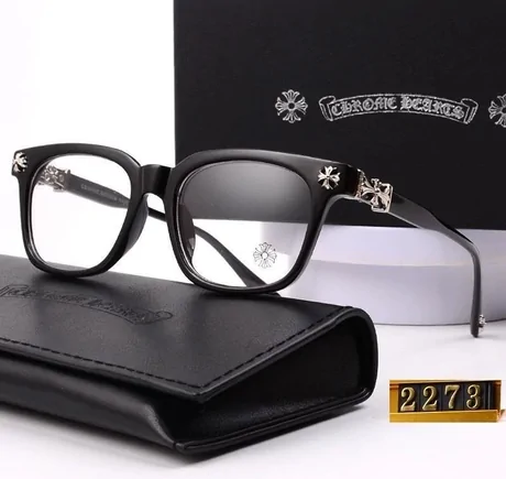 Black square glasses frame on a black case beside a small card printed 2273