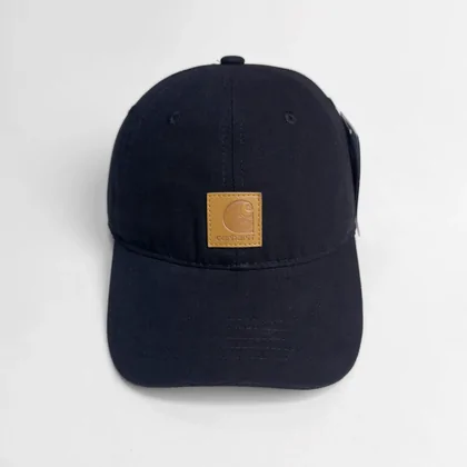 Navy canvas baseball cap with a small square patch